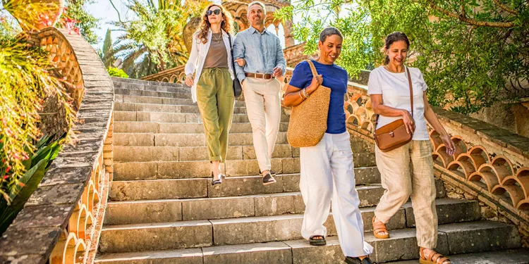 Group of people walking down stairs